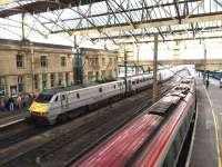 An East Coast service diverted via Carlisle on Saturday 11 October due to engineering works on the ECML between Edinburgh and Newcastle. Electric trains were diesel hauled over the N&C.<br><br>[Kevin McCartney 11/10/2014]