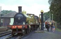 Preserved ex-Highland Railway <I>Jones Goods</I> 4-6-0 no 103 receives more than a few admiring glances at Pitlochry on 21 August 1965. The locomotive was on its way to Inverness to participate in the Highland Railway Centenary celebrations.<br><br>[John Robin 21/08/1965]