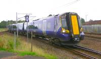 The 1151 Edinburgh Waverley - Ayr crosses the up WCML as it arrives at Carstairs on 4 September 2014.<br><br>[Ken Browne 04/09/2014]