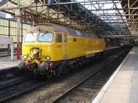 DRS 57306, still in Network Rail yellow, stands in platform 8 bay at Crewe on 30 September. The locomotive was reversing after arrival from Derby, where it had been undertaking new class 387 EMU stock movements. This is the only 57 still equipped to operate directly with new stock without translator vehicles.<br><br>[David Pesterfield 30/09/2014]