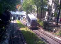 <h4><a href='/locations/P/Paris_Sacre_Coeur_Funicular'>Paris Sacre Coeur Funicular</a></h4><p><small><a href='/companies/R/Regie_Autonome_des_Transports_Parisiens_RATP'>Régie Autonome des Transports Parisiens (RATP)</a></small></p><p>A nice bit of light and shade, half way down the Funiculaire from Sacre Coeur cathedral in August 2014. My wife assures me that there are 219 steps in parallel, but I prefer to ride - up or down. see image <a href='/img/15/923/index.html'>15923</a> 7/18</p><p>04/08/2014<br><small><a href='/contributors/Ken_Strachan'>Ken Strachan</a></small></p>