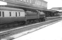 A GWR Churchward 43xx class 2-6-0 arrives at Oswestry in the summer of 1960.<br><br>[David Stewart //1960]