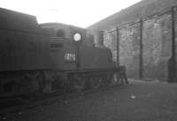 J72 0-6-0T 68750 stored awaiting disposal at Dumfries, thought to be in 1963. Officially withdrawn from here at the end of 1962, the locomotive was eventually cut up in the yard of Messrs McWiliams at Shettleston in February 1964.<br><br>[K A Gray //1963]