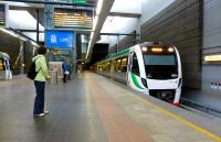 A train for Mandurah at Perth Esplanade subterranean station in October 2014. These trains start at Perth Underground and run on this completely new 70km line opened in 2007. The line runs in the central reservation of the Kwinana Freeway and then alongside other arterial roads. Trains run approximately every 15 minutes off peak and 10 minutes at peak.<br><br>[Colin Miller 07/10/2014]