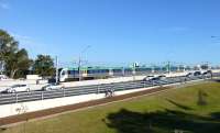 After leaving Perth's Esplanade Station the Mandurah trains face a very steep climb to the Narrows Bridge where they enter the median of the Kwinana Freeway.<br><br>[Colin Miller 07/10/2014]