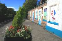 Colourful artwork created by local children in the Arriva Trains Wales Cambrian Schools' Safety Project on display at Criccieth station in October 2014.<br><br>[Colin McDonald /10/2014]