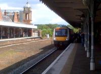 So that's what he was interested in [see image 48675]. Turbostar no. 170272 forms the 1357 to Cambridge at Bury St Edmunds on a bright, sunny 6th August.<br><br>[Ken Strachan 06/08/2014]