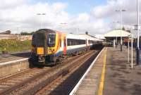 SWT 444043 waits to depart from platform 1 at Wareham on 19 October 2014 with a service to Waterloo. As a result of engineering works to the west of Wareham, services from London were terminating here and returning east after making use of the crossover to the west of the station.<br><br>[John McIntyre 19/10/2014]