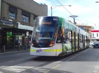 Scene at St Kilda Beach terminus, Melbourne, in September 2014. The latest tram type in Melbourne is this E Class built by Bombardier.<br><br>[Colin Miller 24/09/2014]
