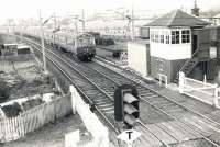 One of the recently introduced North Clyde electric <I>'Blue Trains'</I> slows for the Cardross stop on 26 November 1960 with a Helensburgh Central - Airdrie service. <br><br>[G H Robin collection by courtesy of the Mitchell Library, Glasgow 26/11/1960]