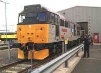 Classic traction at Etches Park on 13 September 2014 in the form of preserved and restored 31271. The locomotive is decked out in BR two-tone grey Railfreight Construction Sector livery - complete with snowploughs. The name carried is <I>'Stratford 1840-2001'</I> (30A being the depot to which the original D5801 was delivered new from Brush Traction in June 1961). Don't you just love celebrating one hundred and sixty-first anniversaries?<br><br>[Ken Strachan 13/09/2014]