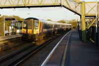 South West Trains EMU no. 444015 passes eastbound non-stop through Wool station, Dorset, during the early evening of 21 October 2014 with a Weymouth to Waterloo service. <br><br>[John McIntyre 21/10/2014]