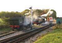 Drummond M7 30053 with U Class 31806 between turns at Norden during the late afternoon of 19 October 2014, having recently arrived double heading a train from Swanage. View towards the former Network Rail boundary near Furzebrook which has now moved to Worget Jct. Recent developments have seen Dorset County Council take over the three miles of track from Network Rail and lease it to the Swanage Railway.<br><br>[John McIntyre 19/10/2014]