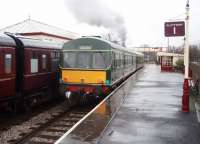 Whilst old DMUs can get a bit smoky this picture is unfair to the ELR Met-Cam set because it hides K4 61994 that had just pulled in to Ramsbottom behind it. The date is 13th December 2008 and the DMU was being used between Ramsbottom and Rawtenstall connecting with the Santa Specials from Bury. [See image 25767] taken from almost the same spot in 1981 to see the transformation achieved by the ELR. <br><br>[Mark Bartlett 13/12/2008]