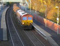 66103 passes Dalgety Bay with the Mossend - Aberdeen Waterloo clay tanks on 1 November 2014. The train was diverted through Fife because of engineering work on the Stirling - Perth line.<br><br>[Bill Roberton 01/11/2014]