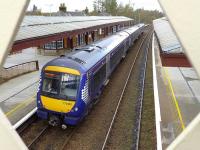 The 12.41 Glasgow Queen Street - Aberdeen calls at Gleneagles on 23 October.<br><br>[Bill Roberton 23/10/2014]