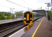 It's not every day that you see an Arriva Trains Wales service in Birmingham. 158.834 passes through a wet Stechford non-stop as it works from Birmingham International to Maccyncleth, where it splits to serve Aberystwyth and Pwllheli [see image 37262].<br><br>[Ken Strachan 10/05/2014]