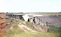 Ever hopeful of traffic, the Weston, Clevedon and Portishead railway built a wharf where the line crossed the Congresbury Yeo River at Wick St Lawrence. The remains of the wharf are seen here in 1963, some 23 years after the line closed.<br><br>[John Thorn //1963]