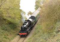 Ivatt 2-6-0 46447 departing from Mendip Vale on the East Somerset Railway on 26 October 1974.<br><br>[Peter Todd //]