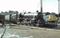 The Scottish Steam Railtours Group <I>Raven's Rock Express</I> stands at  Inverness on 25 September 1982. LMS 5025 is preparing to take the special to Kyle of Lochalsh<br><br>[John Robin 25/09/1982]