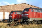 218 434 and 218 221 stabled at Westerland (Sylt) on a sunny but bitterly cold November day in 2005. Westerland is still something of a stronghold for the class, which works the intensive car-carrying shuttle service from Niebuell on the mainland and also Inter-City services from Hamburg. Back in 2005 they handled the regional trains as well, but these have since been taken over by the Nord-Ostsee-Bahn, albeit still using hauled stock.<br><br>[Bill Jamieson 25/11/2005]