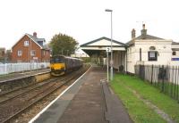 Looking north along the platform at Dorchester West on 24 October 2014 as 150101 calls with a Weymouth to Gloucester service.<br><br>[John McIntyre 24/10/2014]