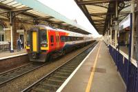 A pair of East Midlands class 158s making a stop at Warrington Central on 4 November 2014 with a service from Liverpool Lime Street to Norwich.<br><br>[John McIntyre 04/11/2014]