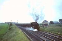 Kingmoor Black 5 no 44899 struggles to restart its train in the rain past Lanark Junction in the summer of 1966. <br><br>[John Robin 15/07/1966]