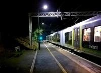 A solitary passenger waits to board the 1748 to London Euston at Hampton-in-Arden on 11 November. This station is not as important as it was before Birmingham International was built, but at least a dozen commuters disembarked. The free parking here is handy if you don't fancy paying 10 to park at the NEC. <br><br>[Ken Strachan 11/11/2014]