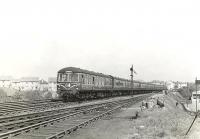 A DMU for Uplawmoor approaching Muirend on 29 April 1960. <br><br>[G H Robin collection by courtesy of the Mitchell Library, Glasgow 29/04/1960]