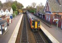 A pair of East Midlands Class 158s calling at Widnes station on 4 November 2014 with a Norwich to Liverpool service.<br><br>[John McIntyre 04/11/2014]