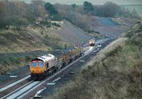 <I>'Let's call it a day...'</I> After a long session of tracklaying on the Borders Railway on 10 November, GBRf 66736 (nearest) and 66752 rearrange themselves into T&T formation at Tynehead for the trip back to Millerhill yard.<br><br>[Ewan Crawford 10/11/2014]