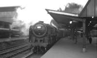 Britannia Pacific no 70022 <I>Tornado</I> stands at Carlisle platform 3 on 7 April 1966 at the head of the 1S93 London Euston - Glasgow Central relief service.<br><br>[K A Gray 07/04/1966]