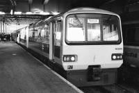 143006 at Edinburgh Waverley with the 18.03 to Bathgate on 25 March 1986, the day after the reopening of the line to passenger services. [See image 16445]<br><br>[Bill Roberton 25/03/1986]