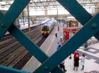 <I>You've been framed!</I> The 14.16 Edinburgh Waverley - Manchester Airport arrives at Carlisle station on 20 May 2014.<br><br>[Ken Strachan 20/05/2014]