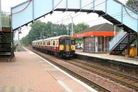 318252 on a Motherwell - Dalmuir service about to pull into platform 1 at Blantyre in August 2006.<br><br>[John Furnevel 18/08/2006]