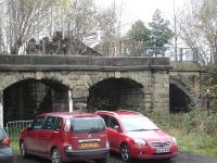 The substantial remains of the hardwood stop blocks for the former coal drops at Penistone goods yard on 13 November 2014. The centre arch is showing warning signs of a potential future collapse. <br><br>[David Pesterfield 13/11/2014]