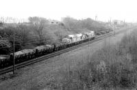 A pair of Transrail liveried class 37s entering Millerhill yard from the north in January 1998 with a spoil train.<br><br>[John Furnevel 12/01/1998]