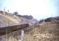 Royal Scot 46140 <I>The King's Royal Rifle Corps</I> starts the descent of Neilston Bank at Shilford at the head of a Carlisle train on the first day of April 1965.<br><br>[John Robin 01/04/1965]