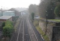 The old goods shed still stands at Chatburn, seen here looking west from the road bridge, with the former station (closed in 1962) behind the camera. [See image 18761] [Ref query 5543]<br><br>[Mark Bartlett 15/11/2014]