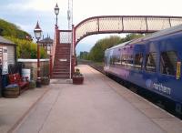 The driver looks back at Settle station on 20 May 2014 before setting off with the 19.55 service to Leeds.<br><br>[Ken Strachan 20/05/2014]