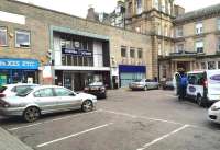 The main entrance to Inverness Station, facing onto Station Square, just off Academy Street, on 19 November 2014. The Royal Highland Hotel (formerly The Station Hotel) stands alongside on the right.<br><br>[Andy Furnevel 19/11/2014]