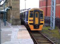 Northern Trains unit 158792 appears to be playing hide and seek at the south end of Carlisle station on 20th May. There is a similar 'behind the wall' siding at Bristol Temple Meads.<br><br>[Ken Strachan 20/05/2014]