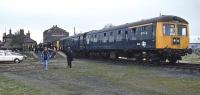 On Saturday 21st April 1979, Class 105 DMUs returned to Fakenham East station for one last day after an absence of almost 15 years. The train was a railtour named the Fakenham Flyer. The passenger service was withdrawn in 1964 and, as is evident from the photo, the platform could only accommodate one two-car unit. Total closure of this section of the line came in 1980 and the site was later transformed into a housing estate.<br><br>[Mark Dufton 21/04/1979]