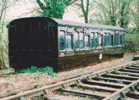 Next April 1st, try telling someone gullible that the Midland Railway made its coaches out of molten chocolate. This photograph will be all the evidence you need. Rowden Mill and neighbouring Fencote are two beautifuly restored stations between Bromyard and Leominster, both well worth a visit on their annual Open Days. This view looks South-West in 2007; the track led to Leominster until closure in 1952.<br><br>[Ken Strachan //2007]