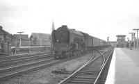 An ECML express about to run through Doncaster on Saturday 29 July 1961 on a service from Peterborough (then Peterborough North) to Edinburgh Waverley. The train is hauled by York based A2 Pacific 60515 Sun Stream.<br><br>[K A Gray 29/07/1961]