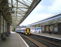 A mid-afternoon Aberdeen - Glasgow Queen Street 158 service arrives at Arbroath station in August 2006.<br><br>[John Furnevel 09/08/2006]