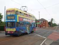 <I>Millennium</I> tram 709 on the level crossing at Broadwater heading for Fleetwood in 2009. Broadwater changed significantly during the tramway refurbishment [see image 38274] but although 709 was one of a number of double deckers selected for modifications to allow them to operate regular services to the new tram stops the conversion wasn't carried out and it remains in the condition seen here but is stored and not in service.<br><br>[Mark Bartlett 29/05/2009]