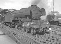 Scene at the west end of Newcastle Central in the early 1960s as Gresley A3 Pacific no 60082 <I>Neil Gow</I> leaves for the south with a train on the ECML.<br><br>[K A Gray //]