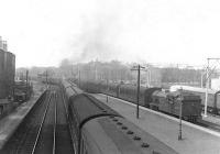 V1 2-6-2T no 67665 brings a train from Airdrie into the terminus at Hyndland on 30 April 1960. On the right is one of the new class AM3 (later TOPS class 303) electric <I>Blue Trains</I>, standing alongside the recently opened Hyndland depot.<br><br>[G H Robin collection by courtesy of the Mitchell Library, Glasgow 30/04/1960]